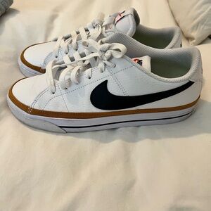 Nike Kids White and Black Sneakers with Gold Accent